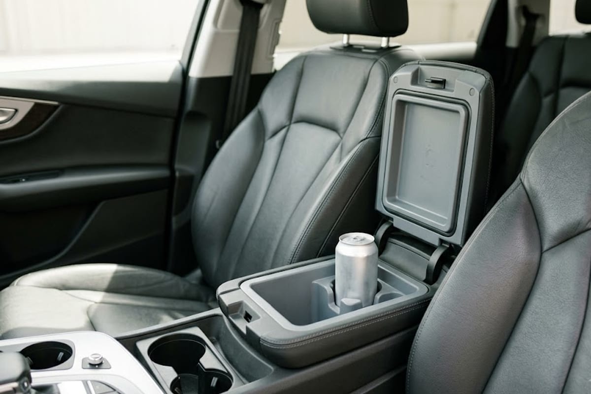The refrigerated cooler box inside a centre console